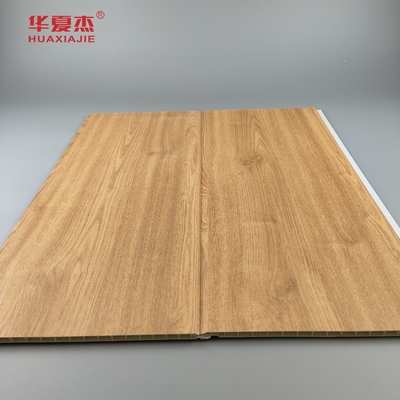 عمده فروشی پنل دیواری PVC دانه چوبی پنل سقف ضد خراش PVC برای تزئینات مسکونی