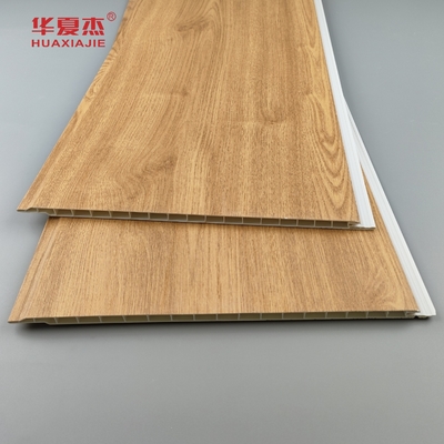 عمده فروشی پنل دیواری PVC دانه چوبی پنل سقف ضد خراش PVC برای تزئینات مسکونی