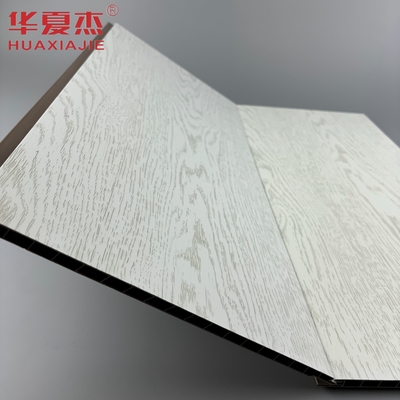 قیمت خوب بهترین فروش پنل دیواری PVC سفید لایه دار پنل سقف PVC دانه چوبی شبیه سازی شده برای آپارتمان آنلاین